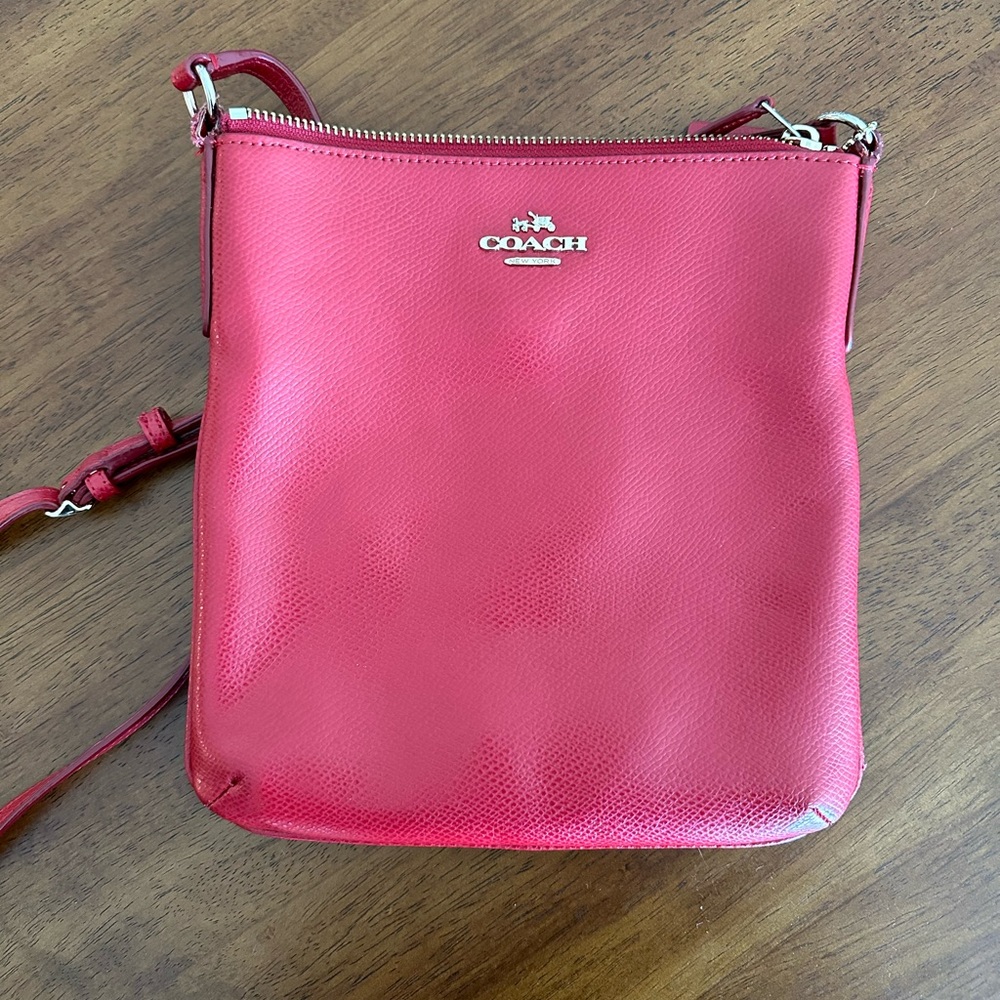 Coach red leather cross-body bag with adjustable strap